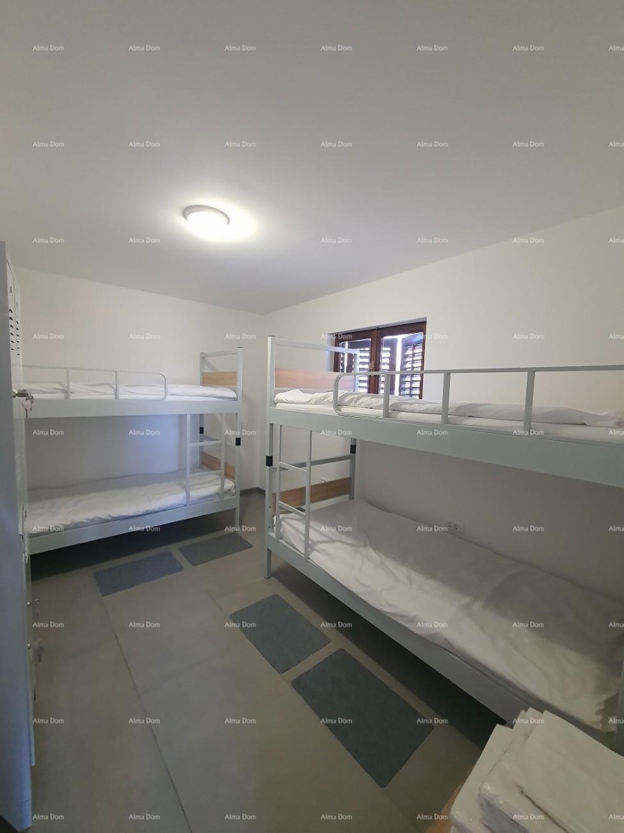 Labin  3-storey house with 3 apartments at a realistic price. 8