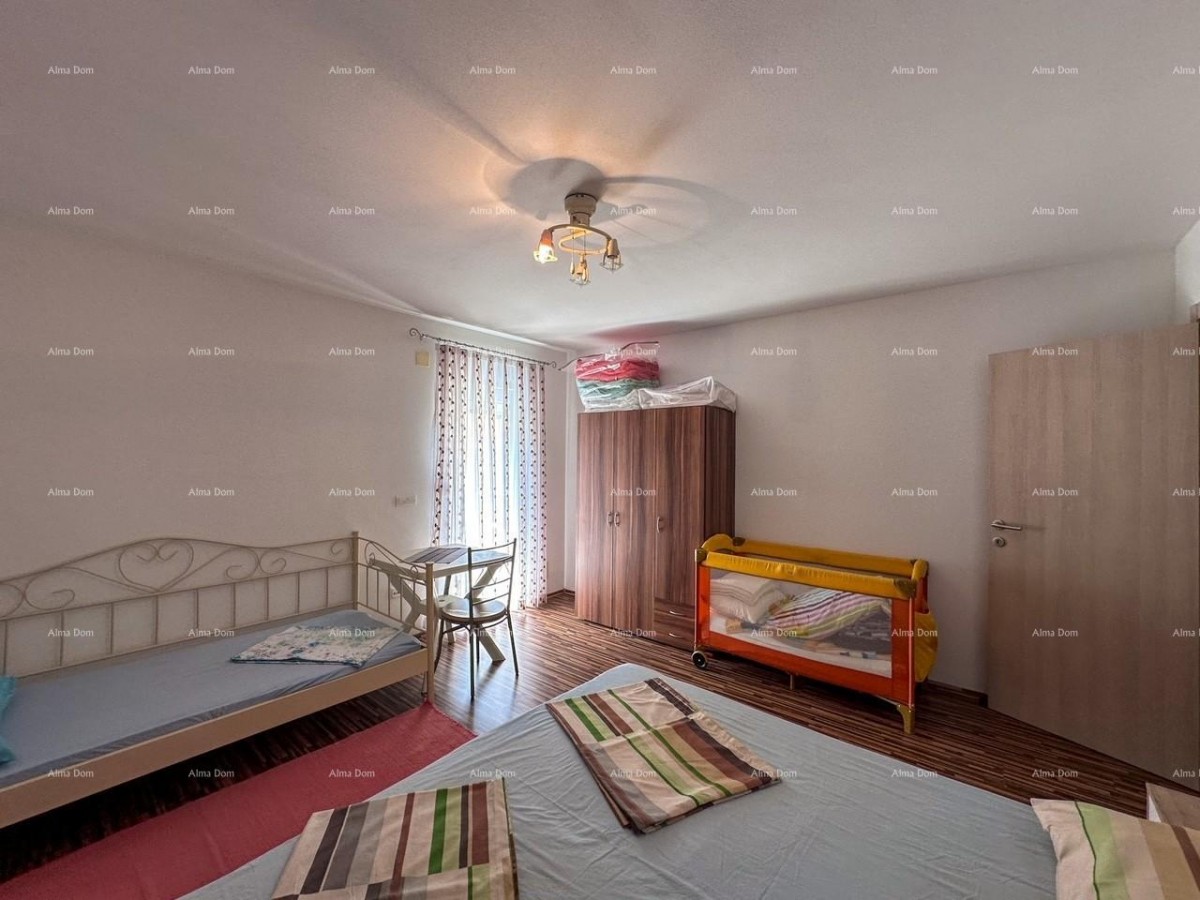 Vendiamo una casa con due appartamenti a Valbandon. 14