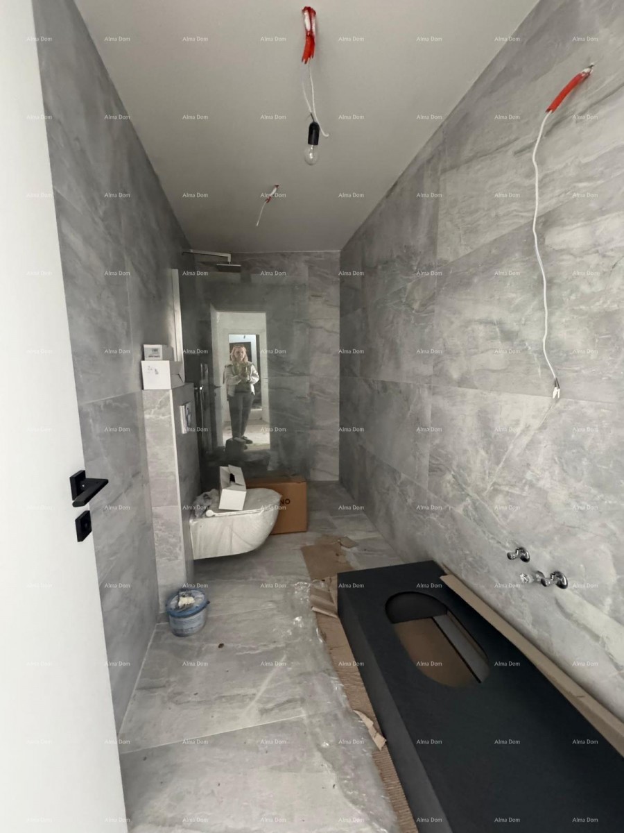 APPARTAMENTO IN VENDITA A ROVIGNO. CON VISTA MARE. 12