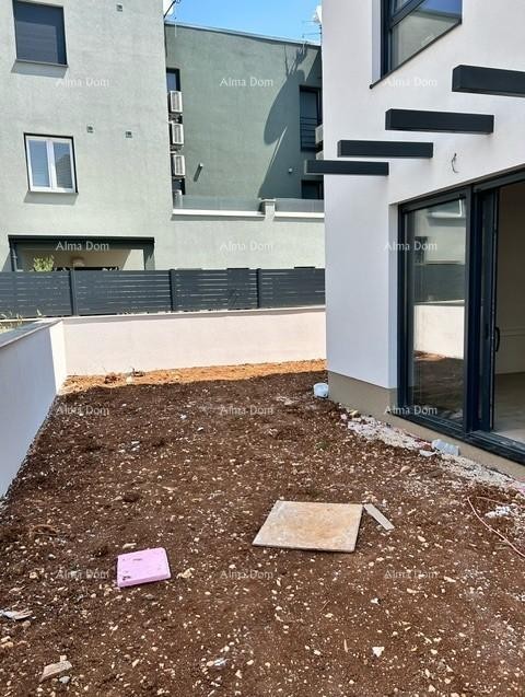 We are selling an apartment in a new building with a garden! ŠTINJAN. 10
