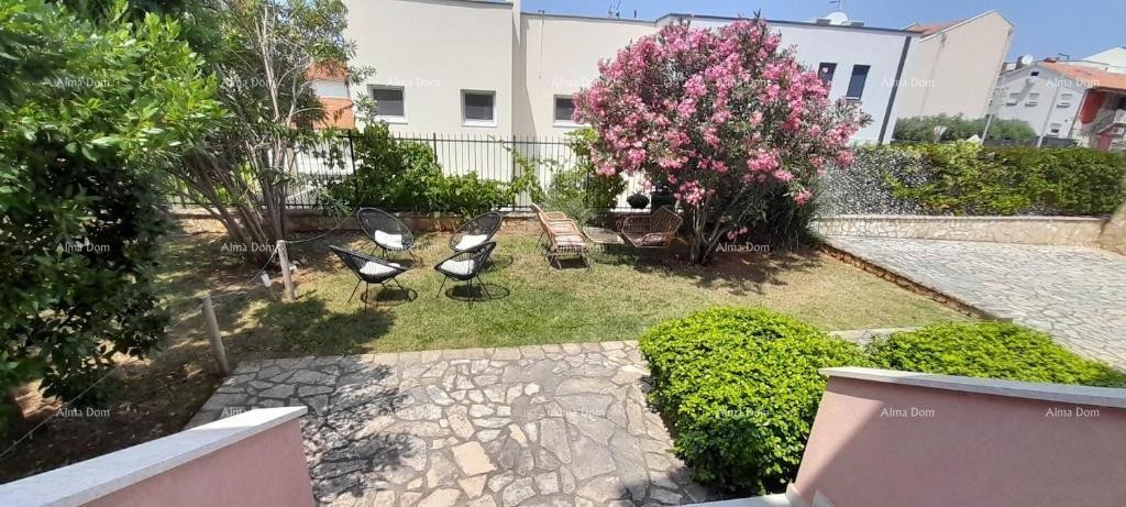 Excellent opportunity! PROPERTY WITH USAGE PERMIT. Exclusive sale of an apartment in a prime location with a garden and parking space. Sea view! Pošesi, Medulin!! 21