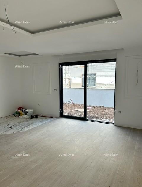 We are selling an apartment in a new building with a garden! ŠTINJAN. 8