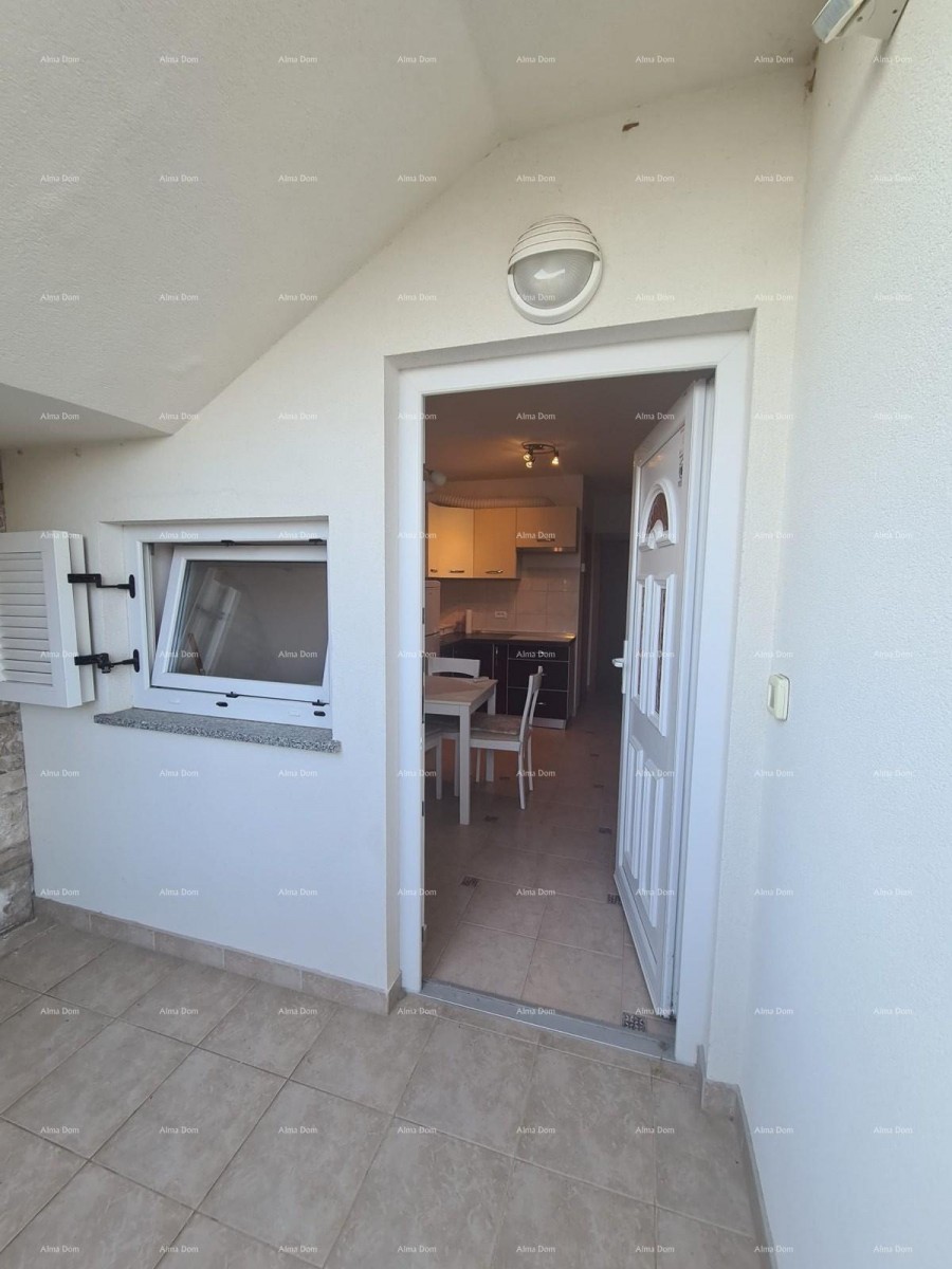 In vendita affascinante appartamento al piano terra, 60 m², Duga Uvala 10