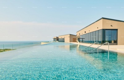 Luksuzni resort s krovnim infinity bazenom!