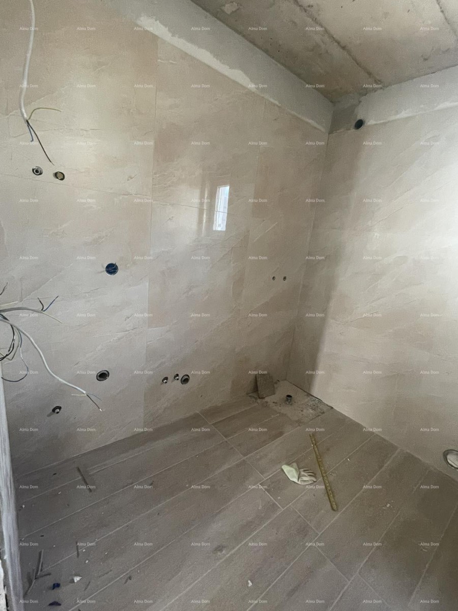 Prodaja hiše s tremi stanovi v Medulinu 12