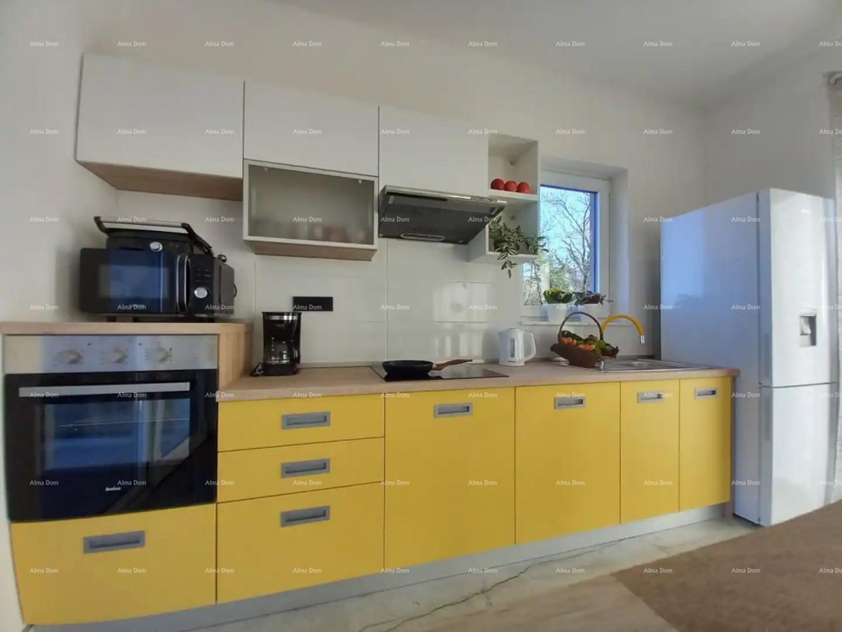 V okolici Marčane je naprodaj enonadstropna hiša z bazenom 14