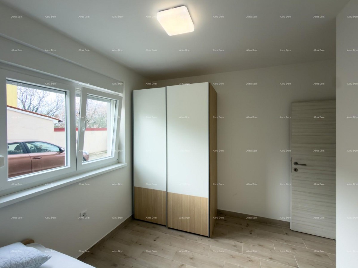 We are selling a new apartment of 63 m2 in Peroj! 15