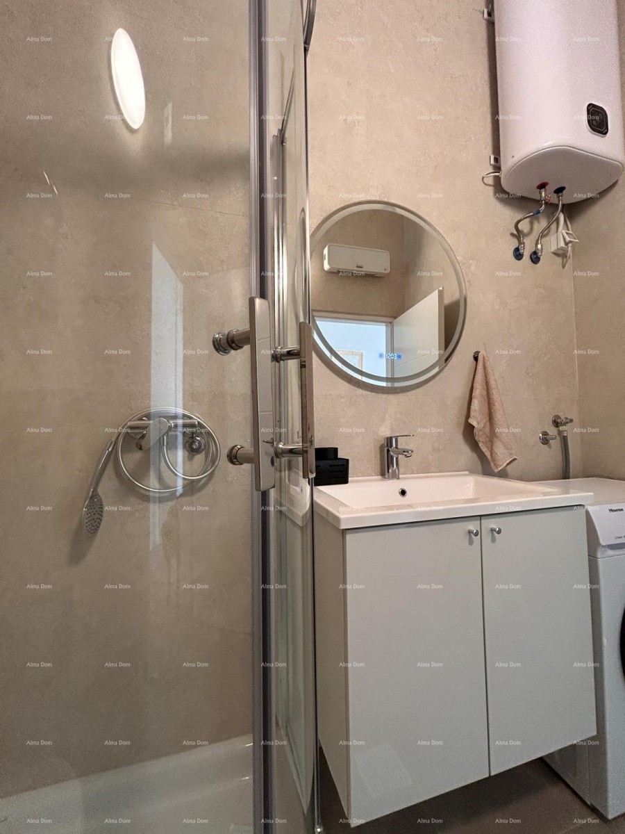 Medulin. Two-bedroom apartment with a view right by the sea 12