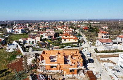 Четырехкомнатная квартира S1 с садом в новостройке в Канфанаре