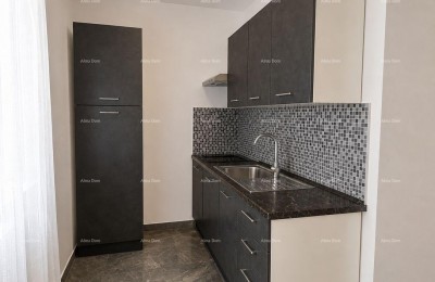 Renoviran stan v centru Pule, 50 m² s talnim ogrevanjem in modernim dizajnom