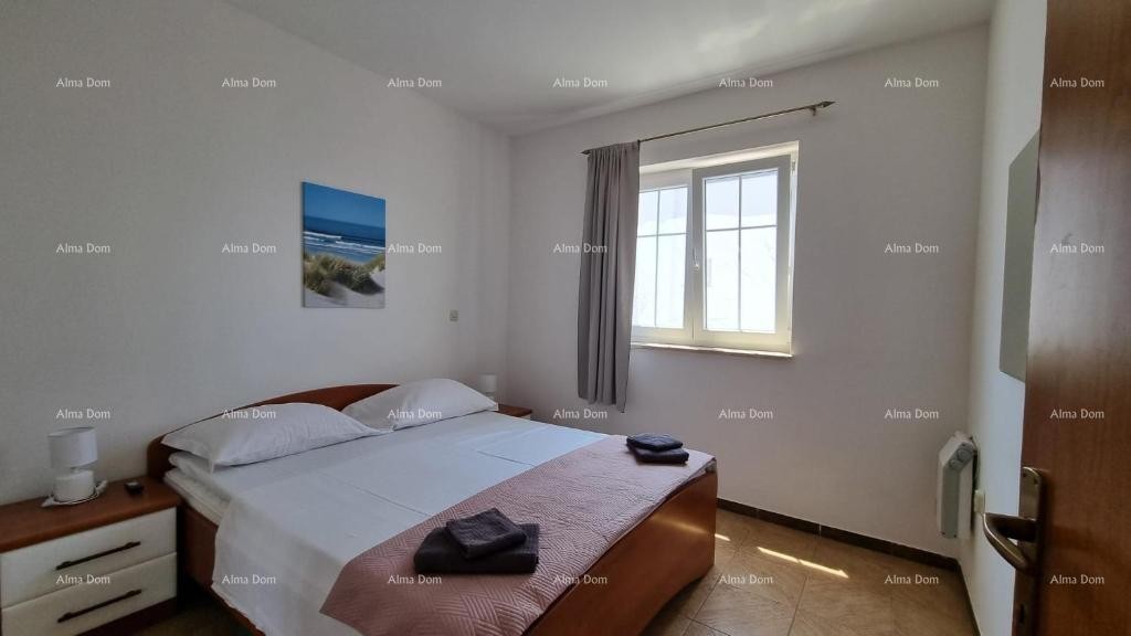 Excellent opportunity! PROPERTY WITH USAGE PERMIT. Exclusive sale of an apartment in a prime location with a garden and parking space. Sea view! Pošesi, Medulin!! 13