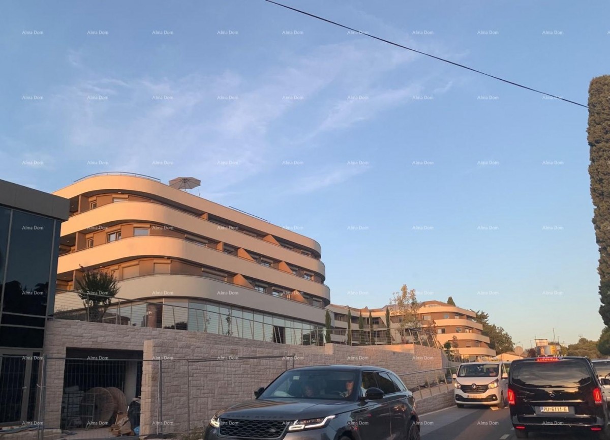 Poreč, stanovanjsko poslovni objekt v gradnji s stanovanji in podzemnimi garažami 24