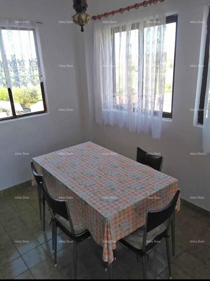 Vendita di un appartamento in condominio in casa familiare, Umago 1