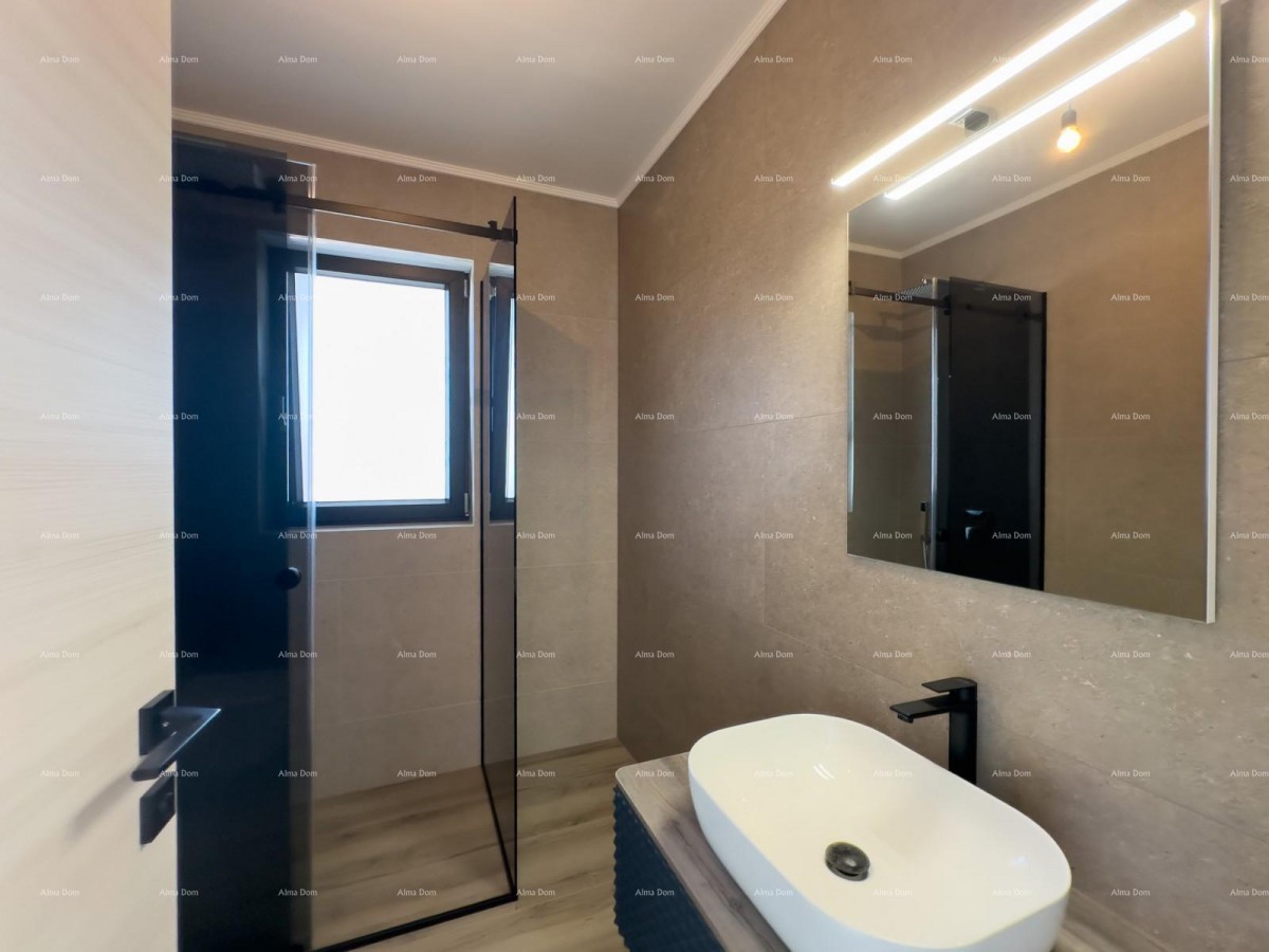 We are selling a semi-detached villa with a pool and a garage 28