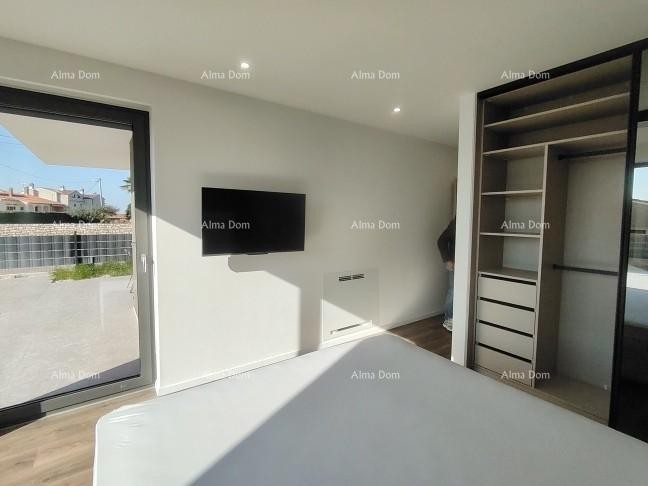 Eccellente appartamento trilocale con giardino e piscina, arredato 27