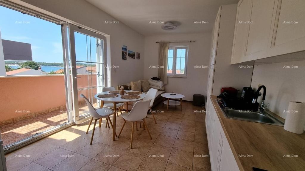 Excellent opportunity! Exclusive sale of an apartment in a prime location with a garden and parking space. Sea view! Pošesi, Medulin!! 11