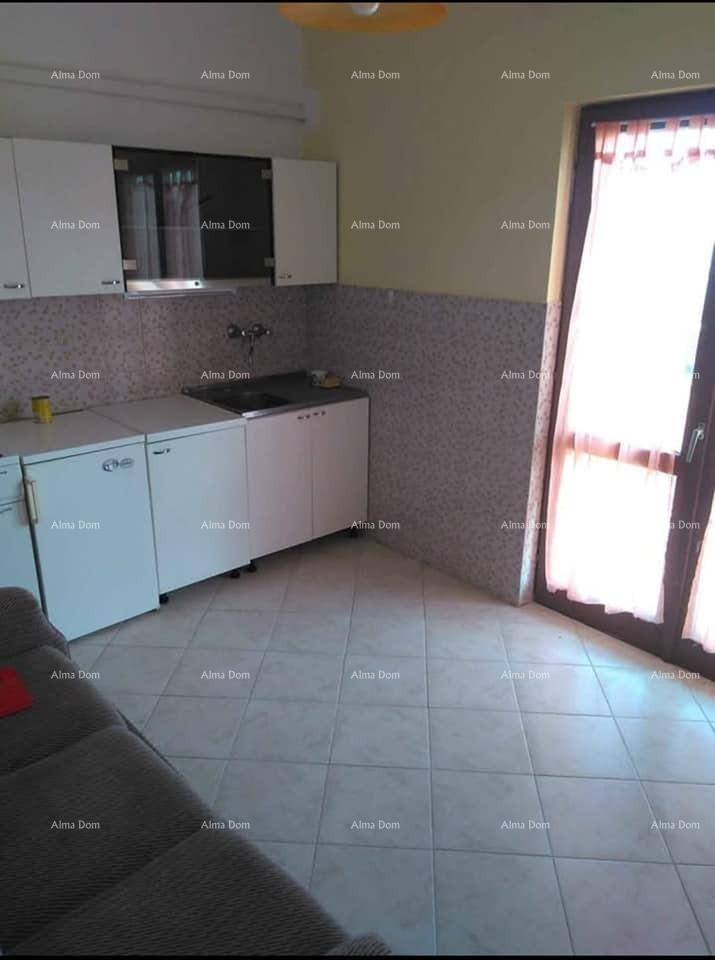 Vendita di un appartamento in condominio in casa familiare, Umago 2
