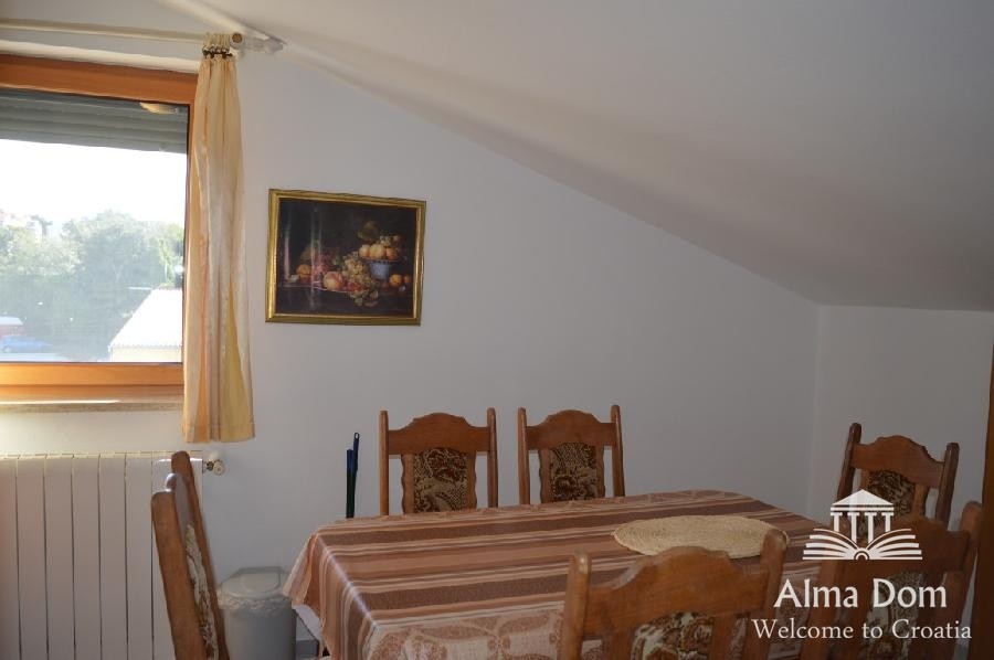 We are selling a house with five apartments in Medulin. 18