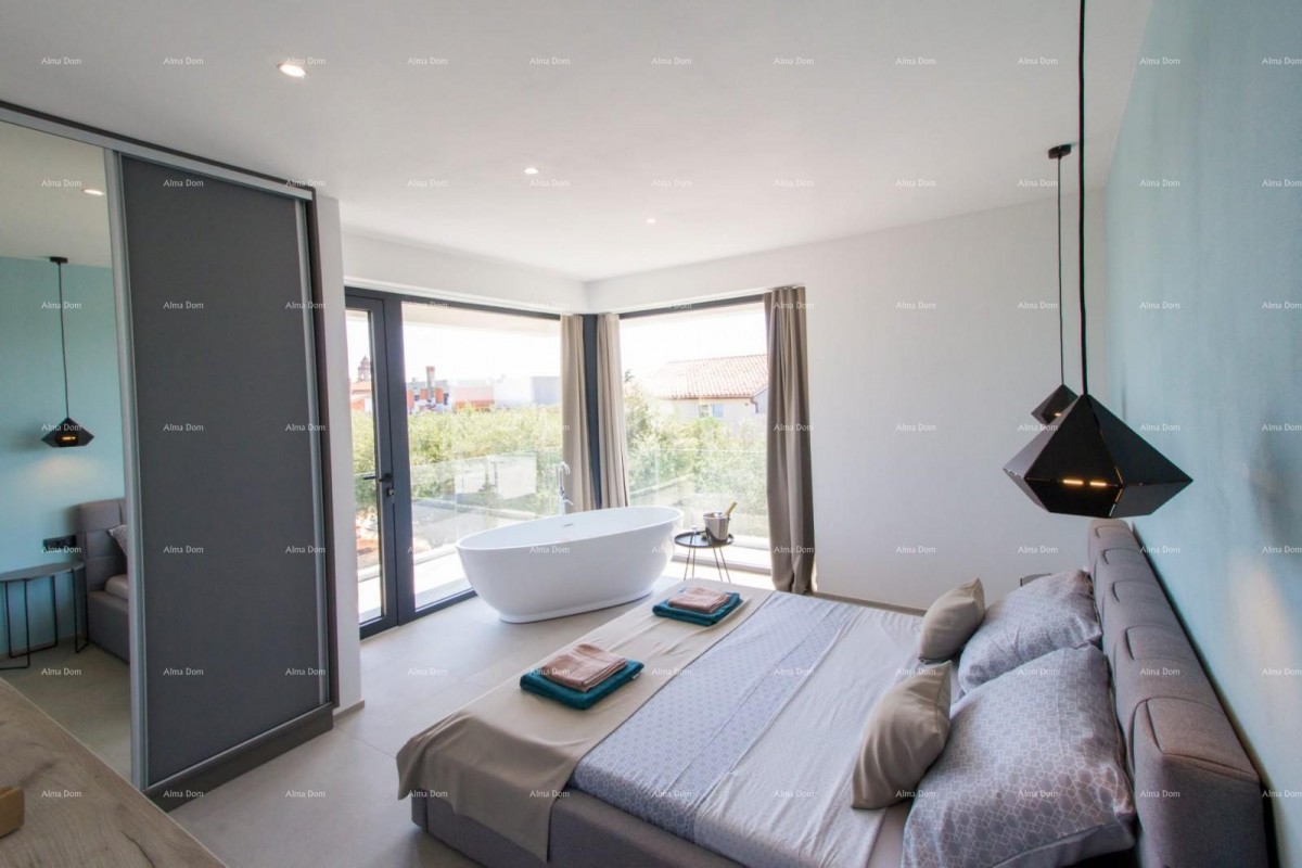 For sale is a modern and luxurious villa located in the beautiful village of Peroj 7
