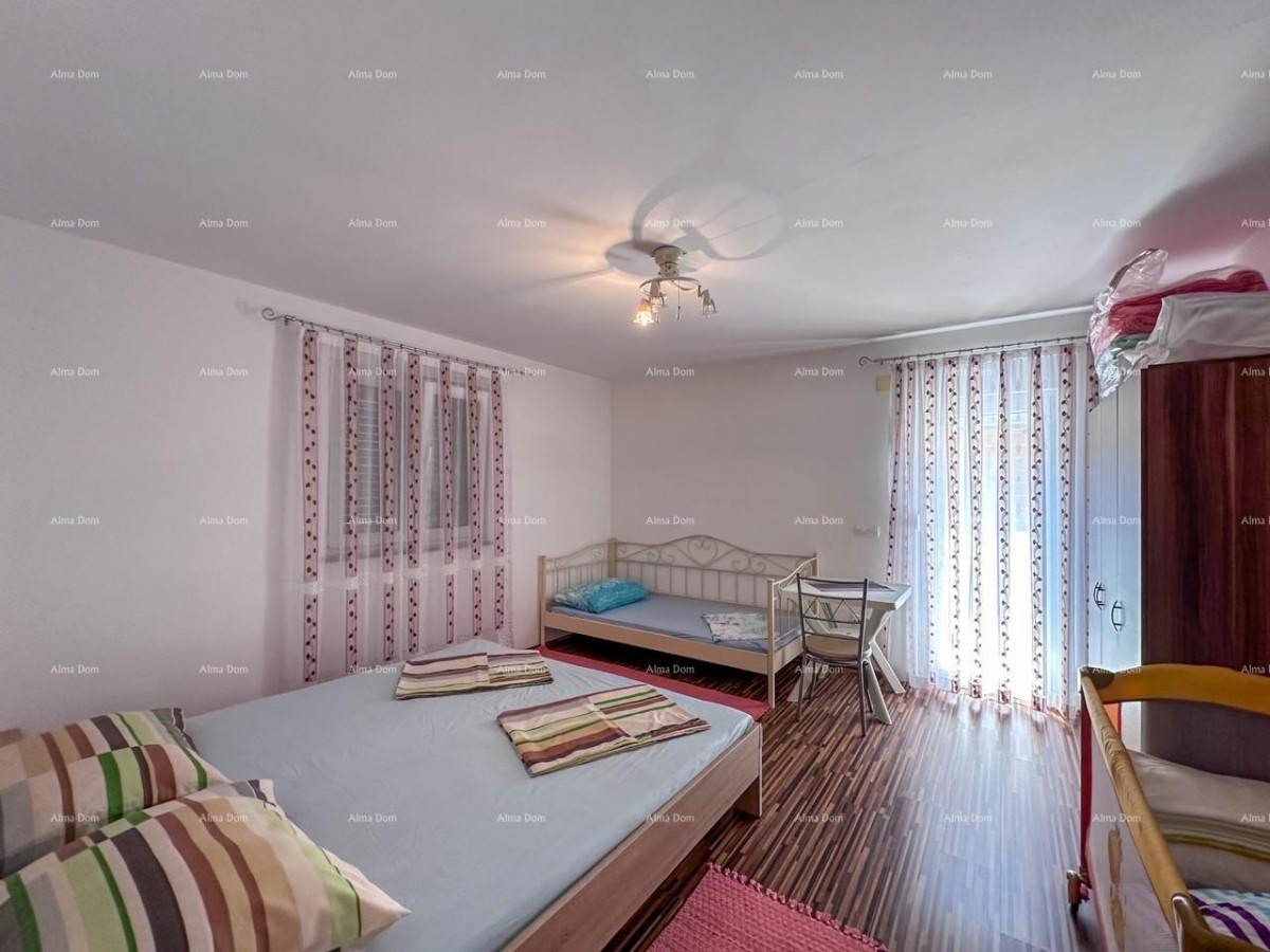 Vendiamo una casa con due appartamenti a Valbandon. 13