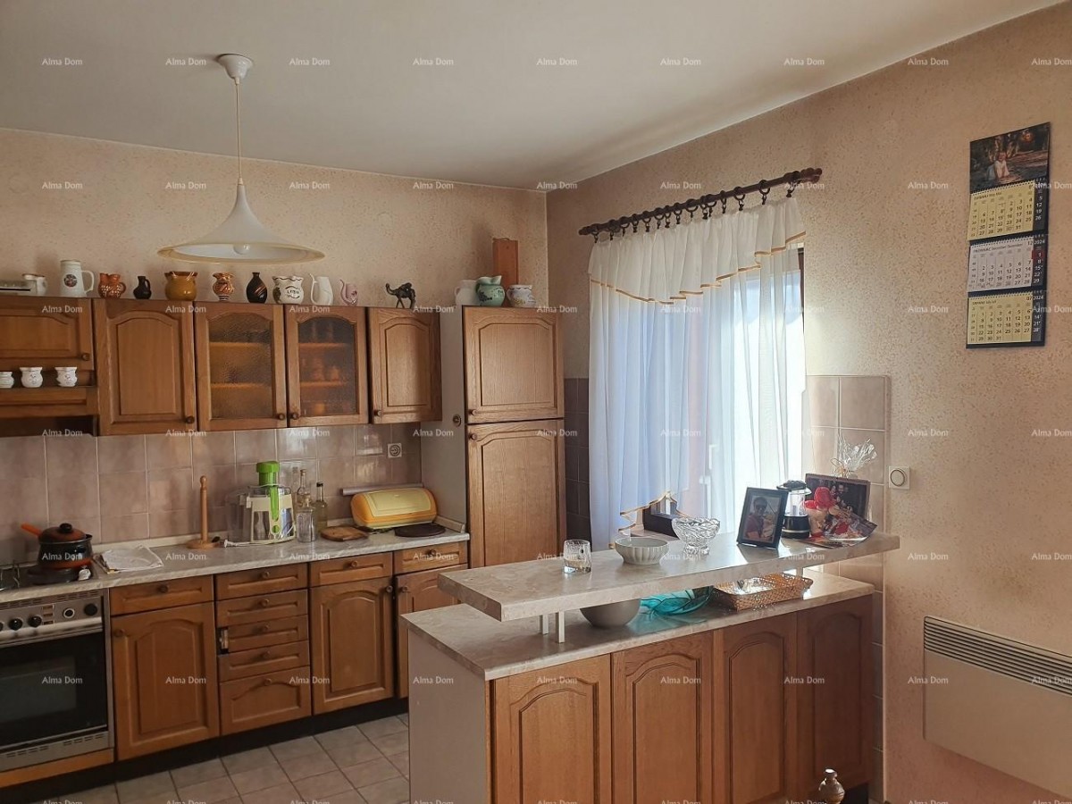 Labin  3-storey house with 3 apartments at a realistic price. 16