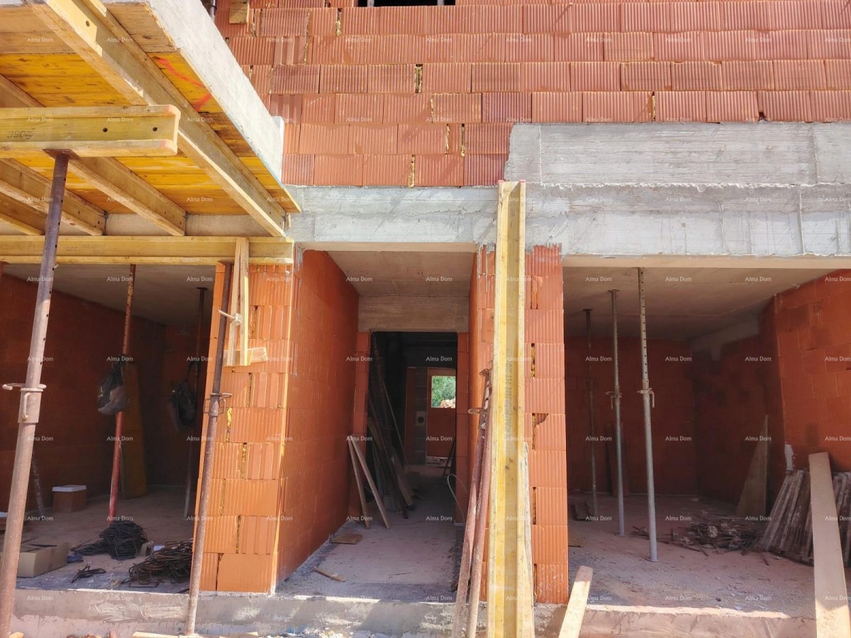 Vendita - appartamento con due camere da letto, giardino e 2 posti auto 1
