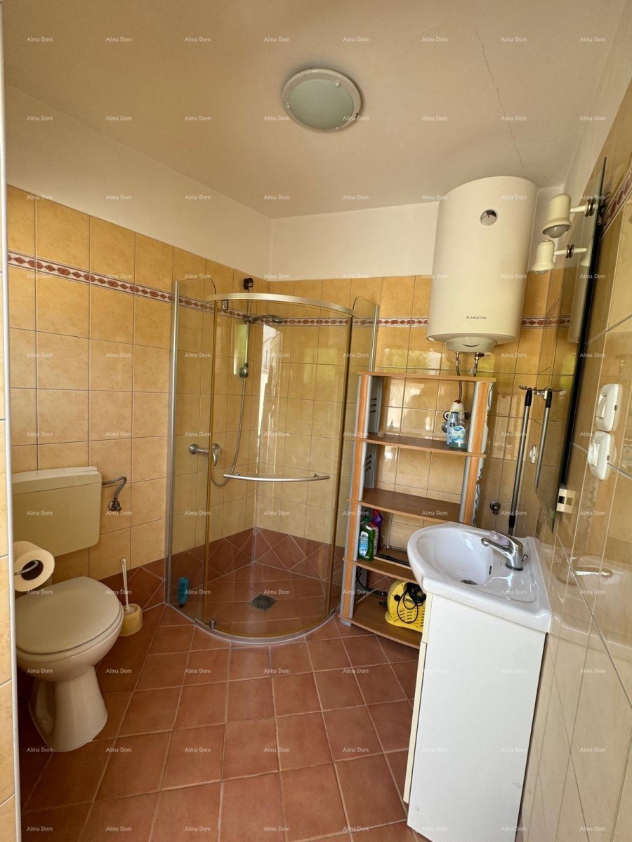 House with a small auxiliary detached room. Medulin. 21