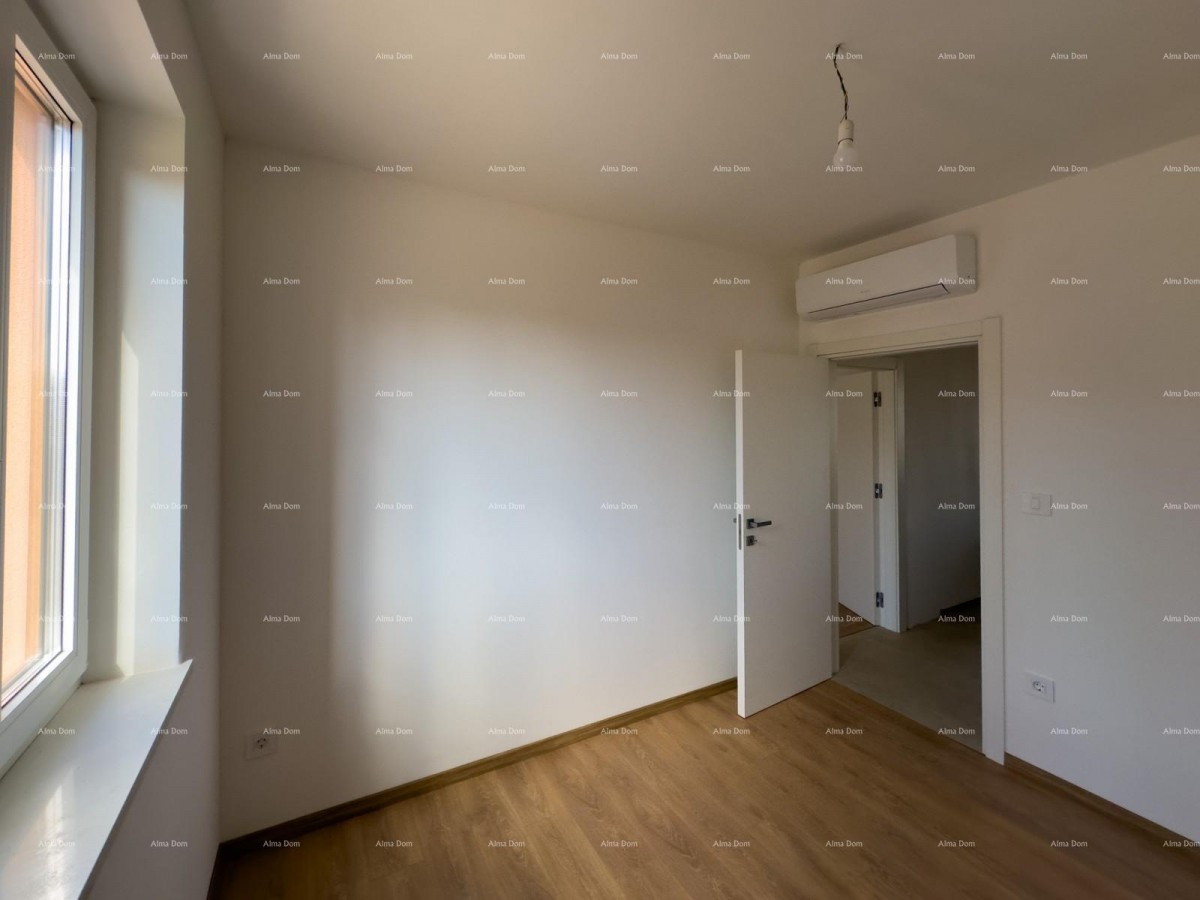 We are selling an apartment with a garden in Barban. 12