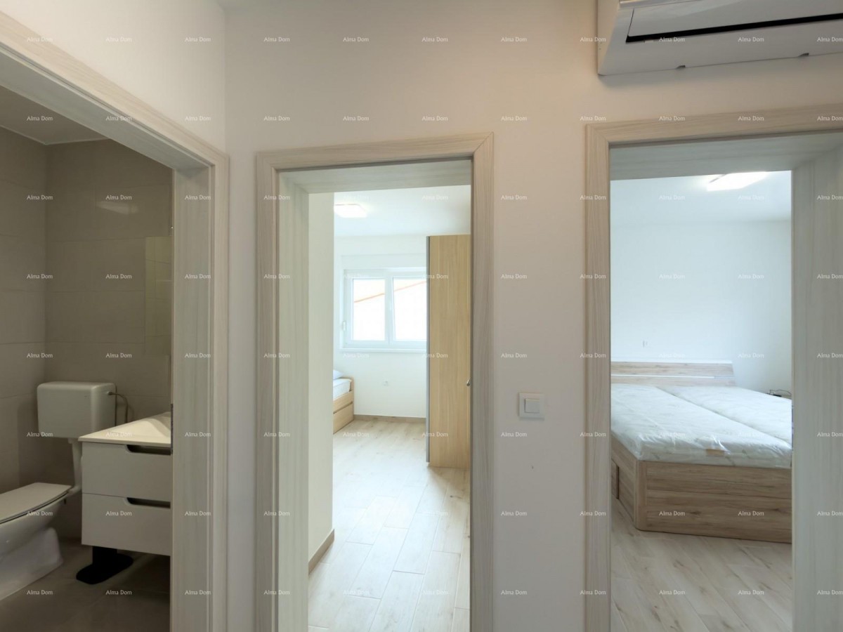 We are selling a new apartment of 63 m2 in Peroj! 13