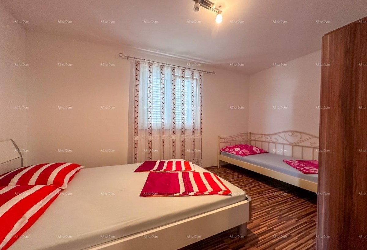 Vendiamo una casa con due appartamenti a Valbandon. 10