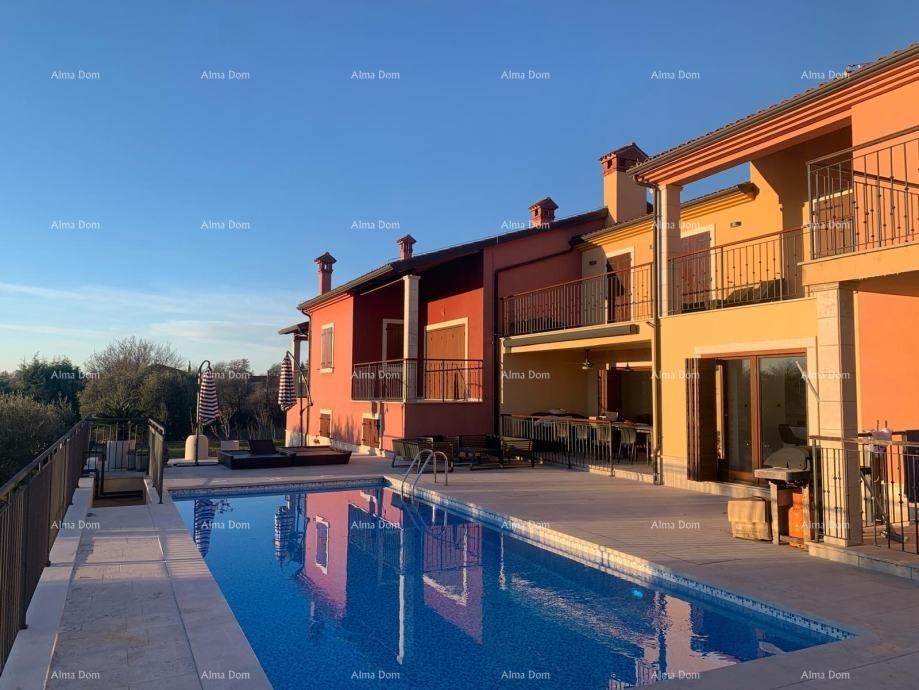 Stunning two-story apartment with a pool and terrace in Buje 1