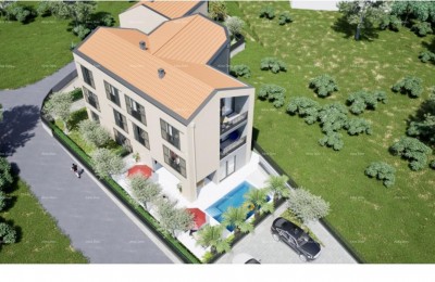 Muntrilj – gradbena parcela s projektom in dovoljenjem za 8 stanovanj