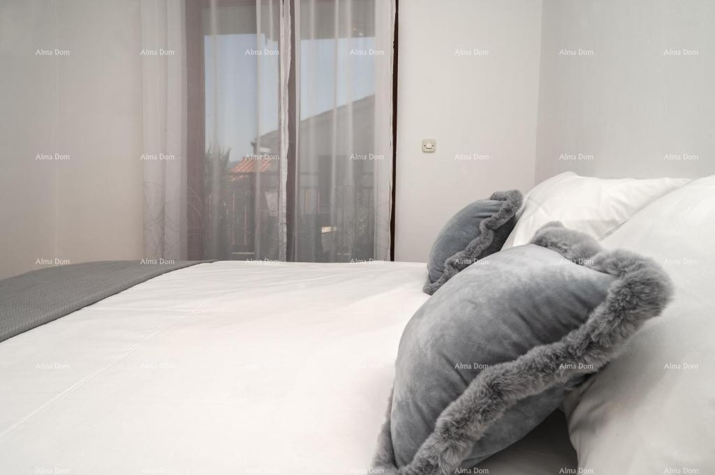 Stiamo vendendo un appartamento a Rabac con vista sul mare. 8