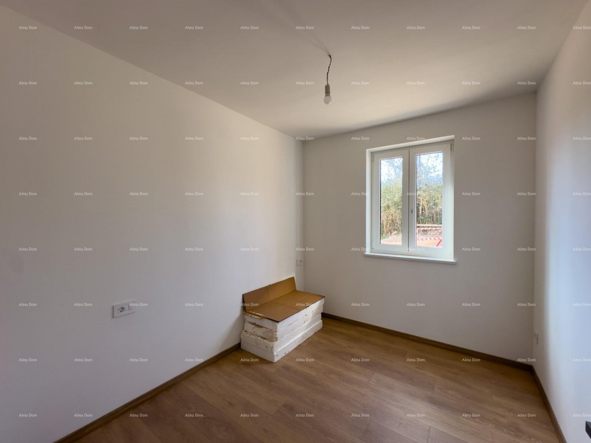 We are selling an apartment with a garden in Barban. 10