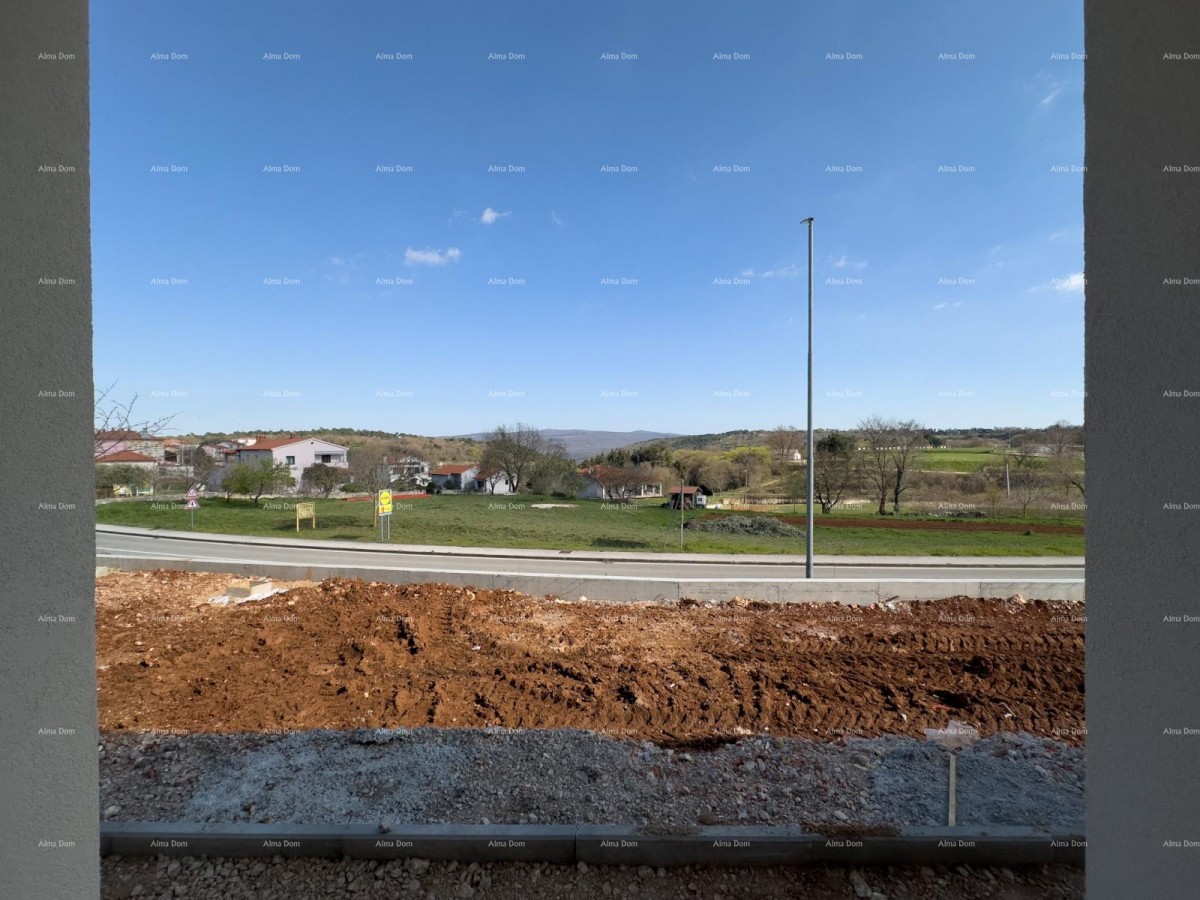 We are selling an apartment with a garden in Barban. 14