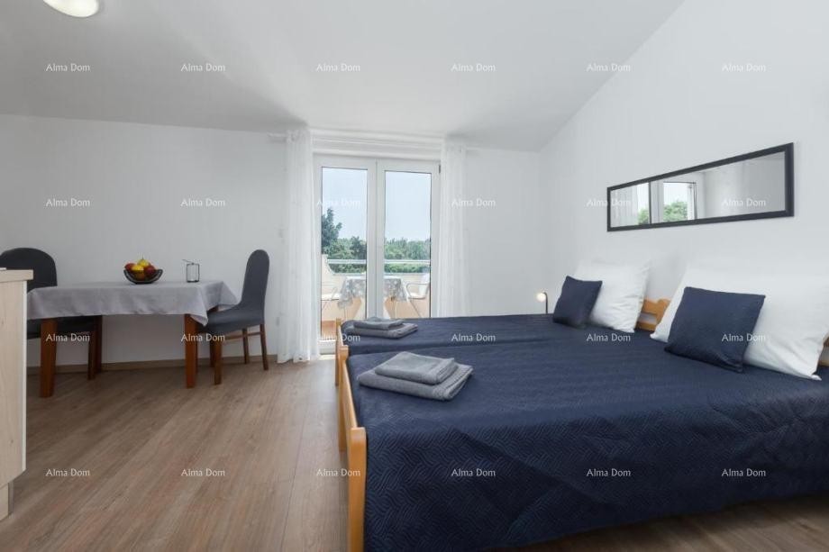 Na prodaju kuća s apartmanima u Štinjanu. 18