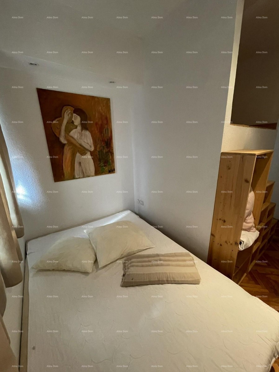 Pula, centar – Prostran trosoban stan od 76,38 m² s dvije terase 13