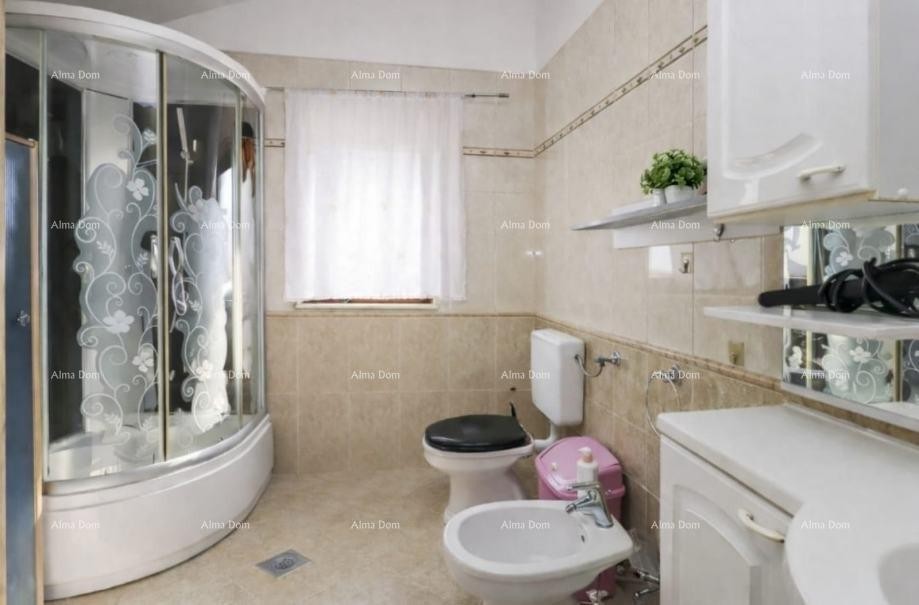 Rovigno – immobile con due appartamenti con vista mare e posto auto 15