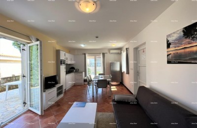 MEDULIN, POŠESI, STAN 73,54 m² S VRTOM, 150 m OD MORA