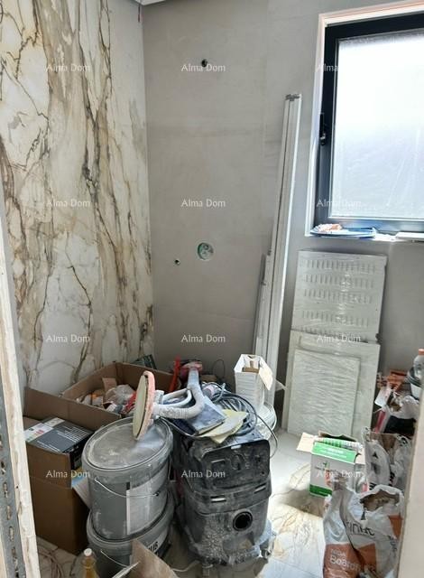 We are selling an apartment in a new building with a garden! ŠTINJAN. 4