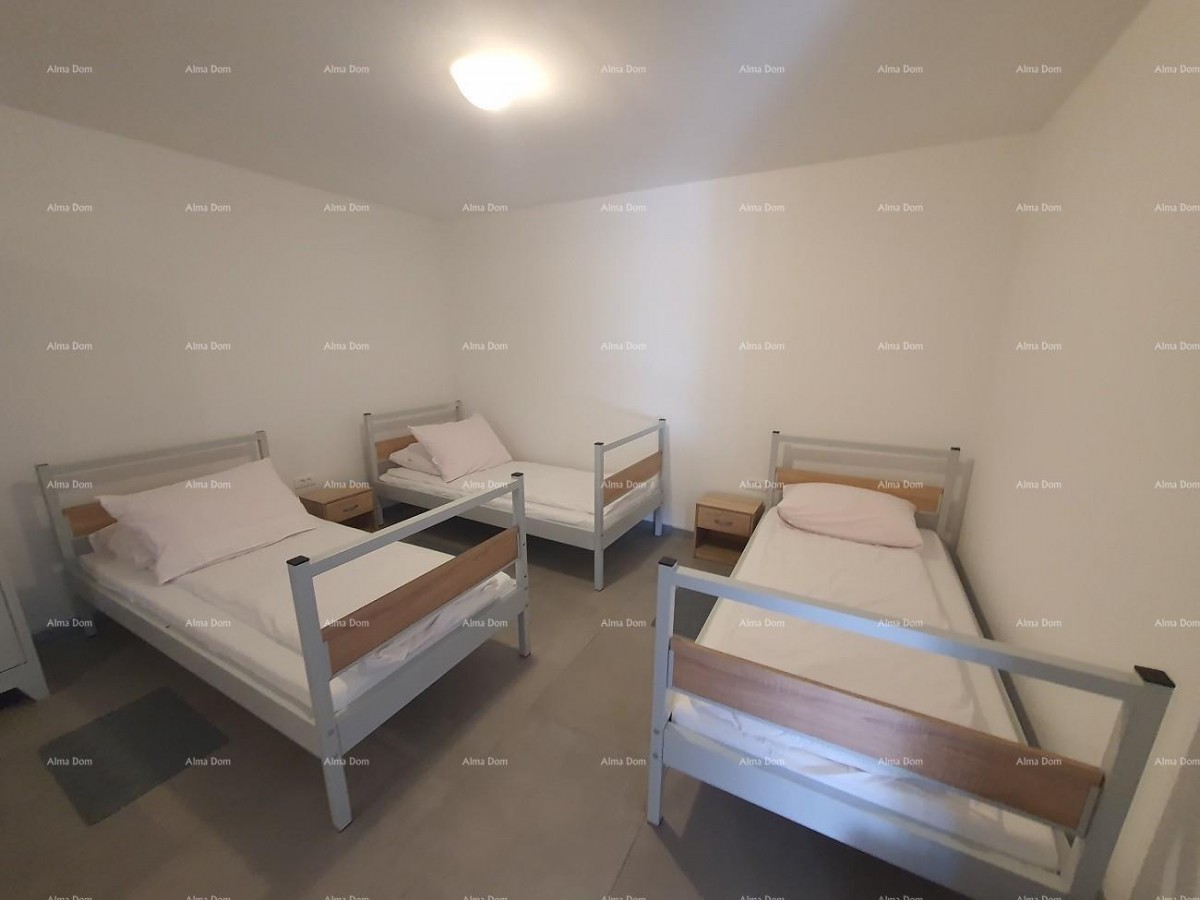 Labin  3-storey house with 3 apartments at a realistic price. 7