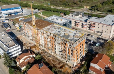 Pula! Multi-family, modern building with an elevator, close to the center. Apartment with a parking space and storage S84.