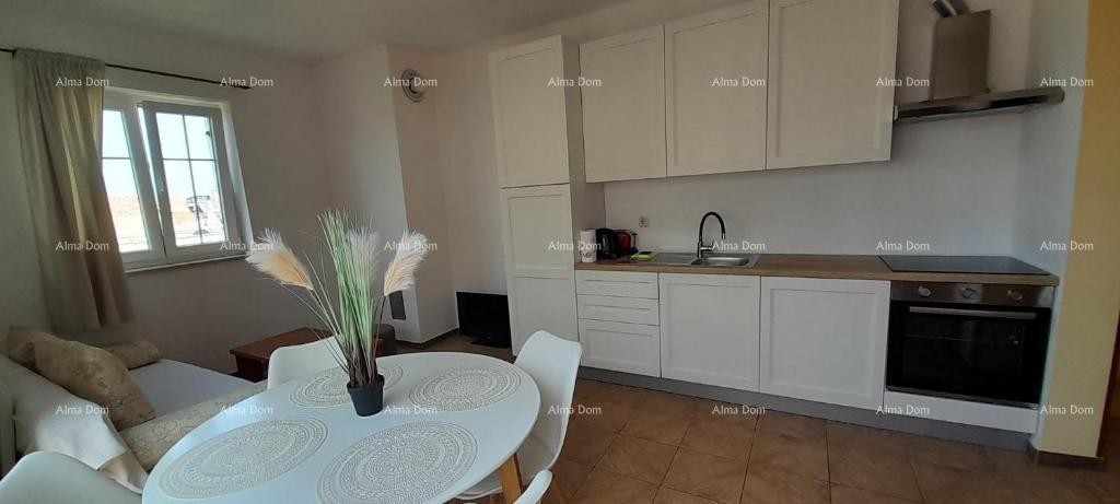Excellent opportunity! PROPERTY WITH USAGE PERMIT. Exclusive sale of an apartment in a prime location with a garden and parking space. Sea view! Pošesi, Medulin!! 6