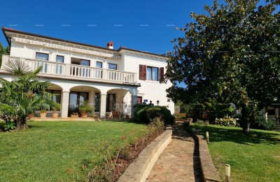 UMAGO - Spaziosa casa con ampio giardino, prima fila al mare