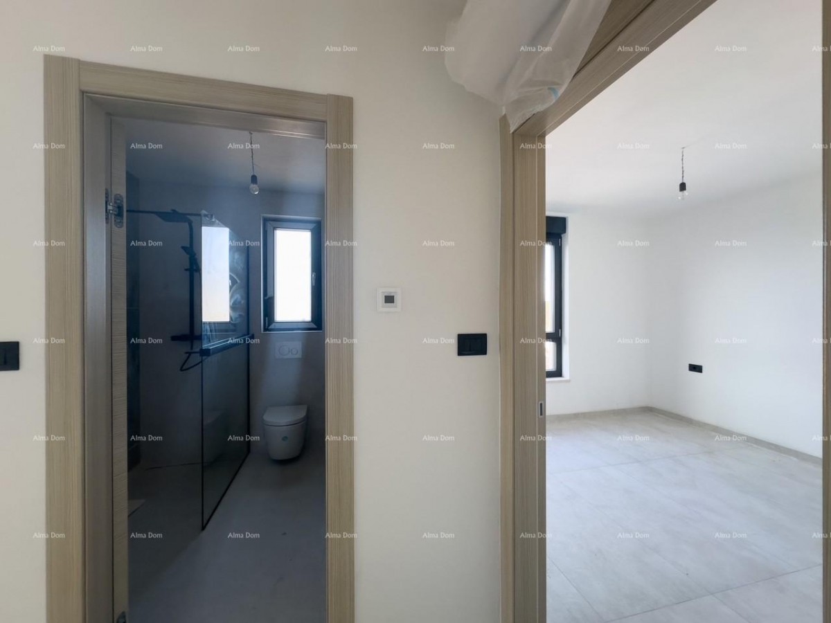 We are selling an apartment in a new building in Banjole. 11