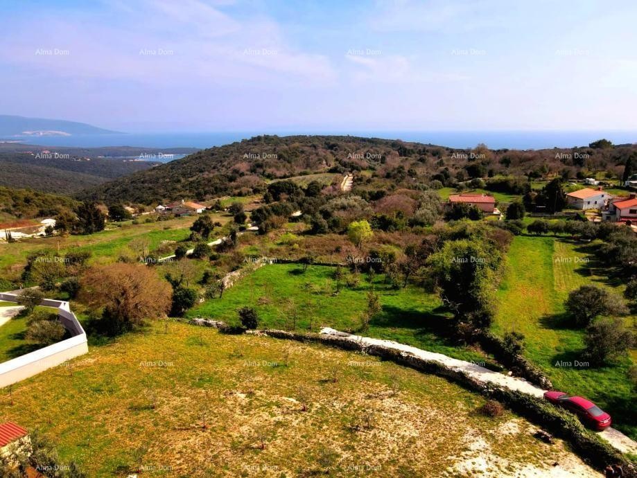 An attractive plot of land with a sea view and a project is for sale, Kavran 2