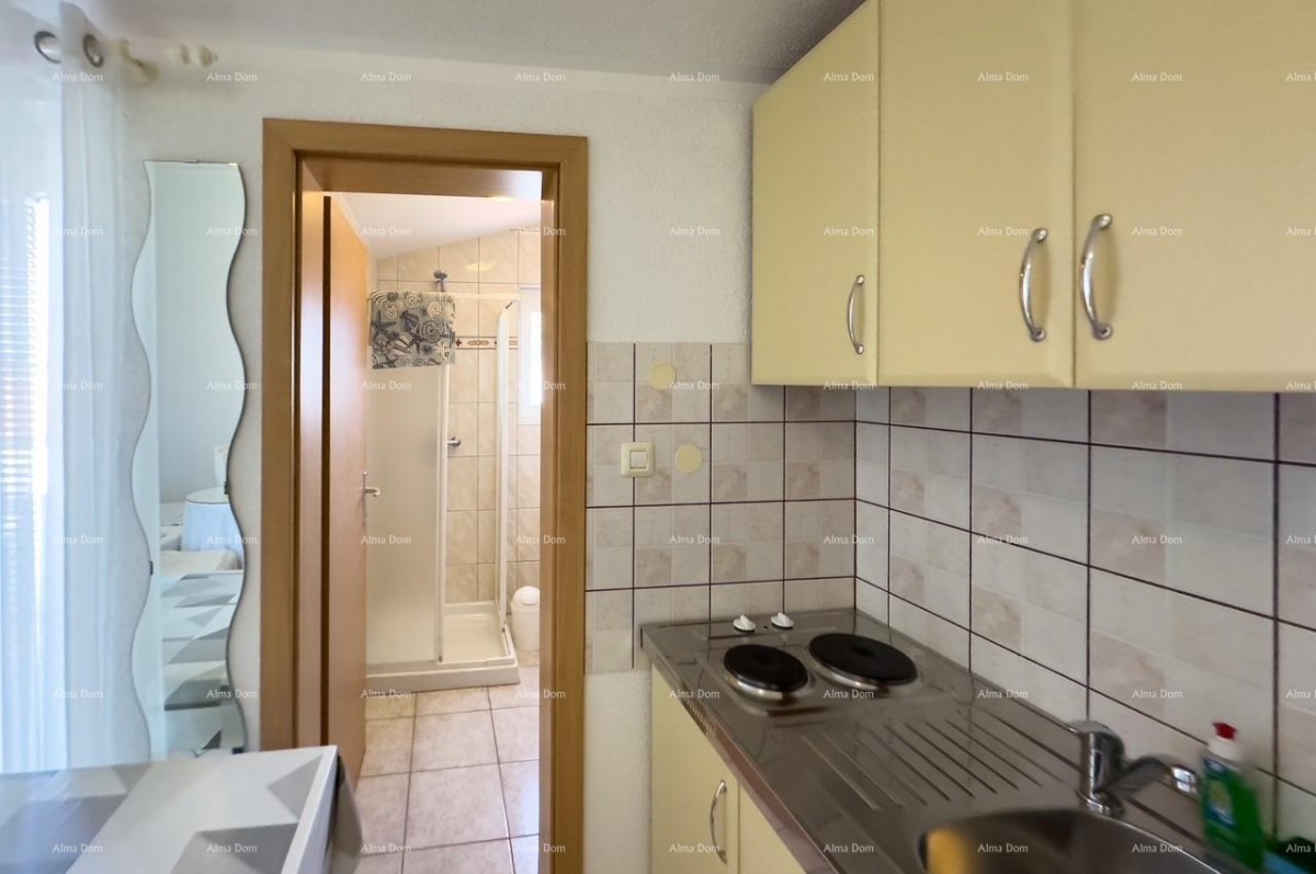 MEDULIN!  Studio apartmen na drugom katu etažirane zgrade. 8
