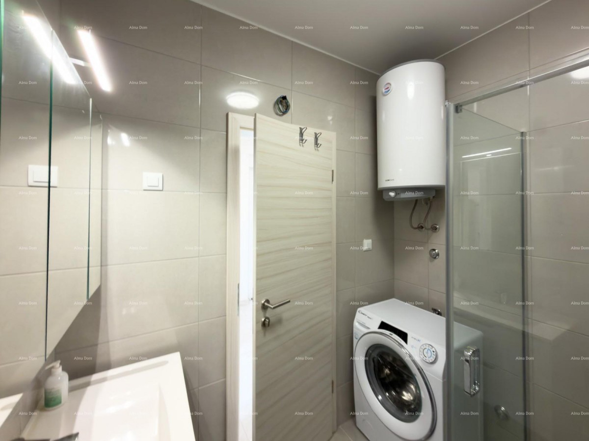 We are selling a new apartment of 63 m2 in Peroj! 12