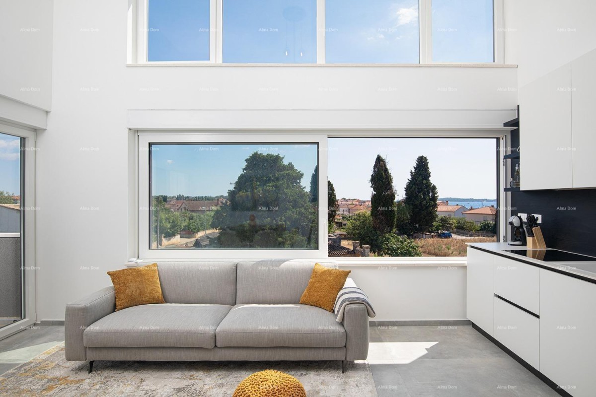 We are selling a penthouse with a sea view in Fazana 1