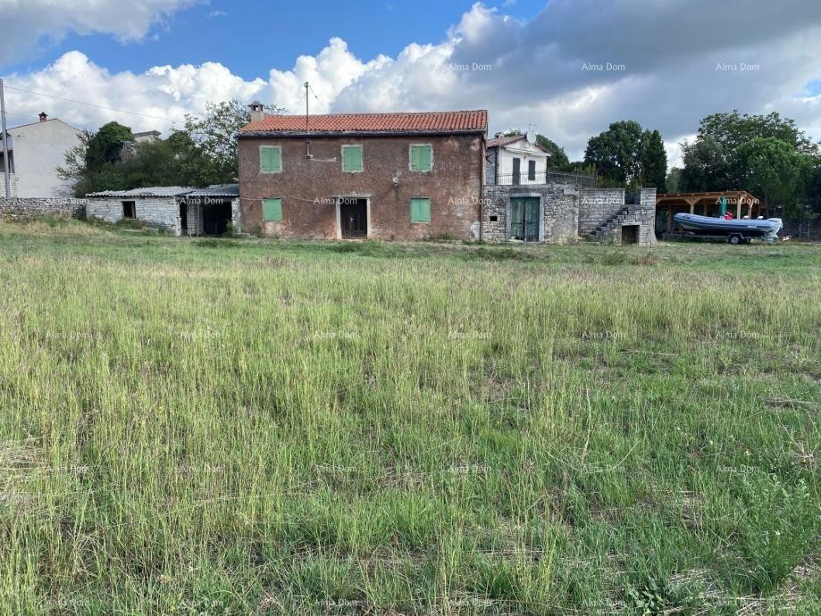 Kanfanar, Terreno edificabile di 2.450 m² con vecchia casa in pietra e vista mare 1